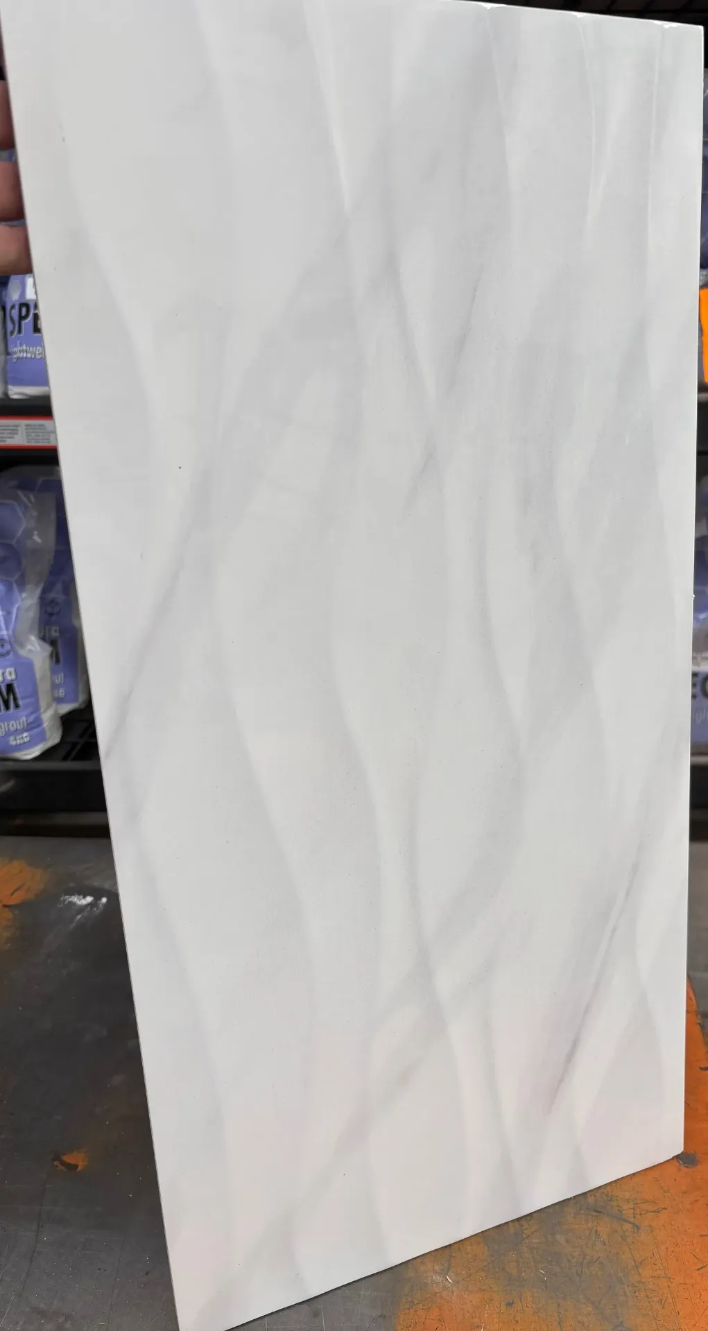Dymo Wave Carrara 300x600 Gloss